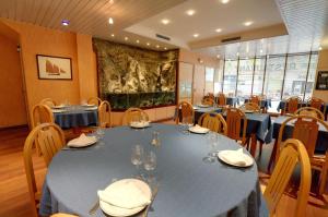 Гостиная зона в Hôtel Restaurant l'Hirondelle