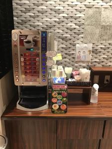 A kitchen or kitchenette at One's Hotel Fukuoka