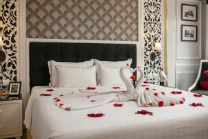 Krevet ili kreveti u jedinici u okviru objekta Lavender Central Hotel & Spa Hanoi