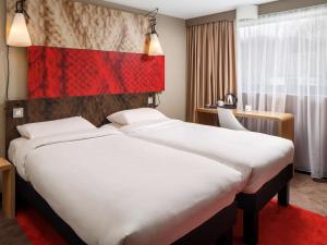 Ліжко або ліжка в номері ibis Orleans Centre Gare