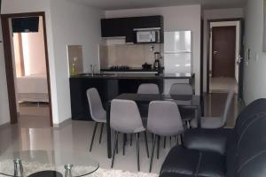 Кухня или мини-кухня в Elegante departamento en Urbarí - Cond. Aruma
