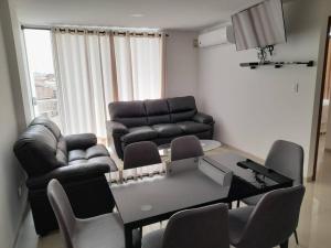 Гостиная зона в Elegante departamento en Urbarí - Cond. Aruma