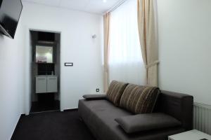 Zona d'estar a Luwiana Suites