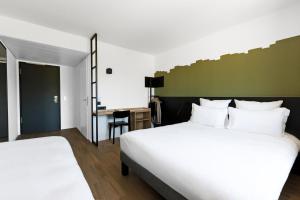 Krevet ili kreveti u jedinici u okviru objekta B&B HOTEL Geneva Airport