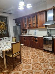 Кухня или кухненски бокс в Benevo Hostel