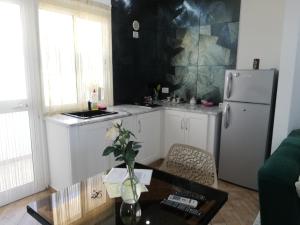 Una cocina o kitchenette en Residence Debbabi sans coupure d'eau