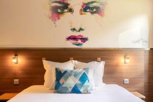 Tempat tidur dalam kamar di Sure Hotel by Best Western Lille Tourcoing Ex Hotel Garden