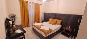 Giường trong phòng chung tại Beach House 29