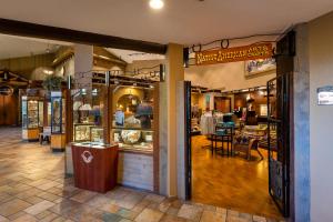 a store front of a store with tables and chairs at The Grand Hotel at the Grand Canyon in Tusayan