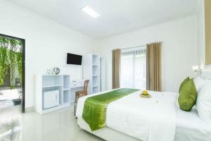 Kesari Glory Nusa Penida by Pramana Villas 객실 침대