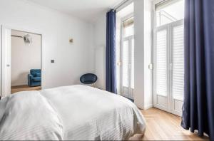 Una cama o camas en una habitación de Appart Deluxe Privé Strasbourg Centre avec Parking gratuit