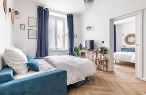 Una cama o camas en una habitación de Appart Deluxe Privé Strasbourg Centre avec Parking gratuit