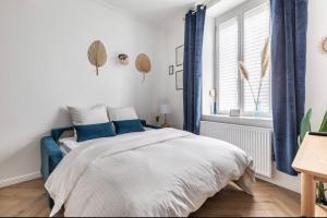 Una cama o camas en una habitación de Appart Deluxe Privé Strasbourg Centre avec Parking gratuit