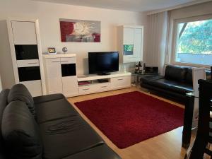 TV tai viihdekeskus majoituspaikassa Deluxe Apartment Baden-Baden