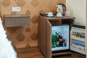 A kitchen or kitchenette at Hotel MAXPLAZA