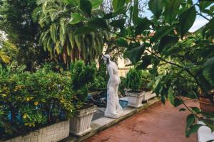 A garden outside Eveline Portosole Hotel