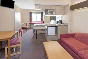 A kitchen or kitchenette at Red Lion Inn & Suites Elk Grove Village