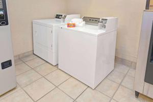 A kitchen or kitchenette at Red Lion Inn & Suites Elk Grove Village