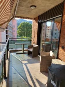 Un balcón o terraza en Da GianFi Lugano-Pregassona - Stanza privata - Adults Only