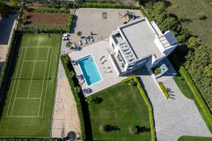 Facilități de tenis și/sau squash la sau în apropiere de Villa Marijeta exclusive 5 star villa with 50sqm private pool, 6 bedrooms and playroom