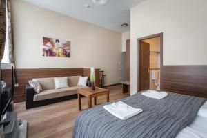 Lova arba lovos apgyvendinimo įstaigoje Elit Boutique Rooms- Best Location by BQA