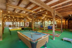 a large room with a pool table in it at Best Western Inn of the Ozarks in Eureka Springs