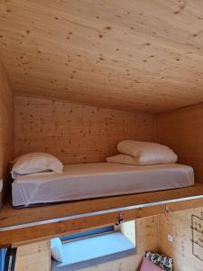 Krevet ili kreveti u jedinici u objektu Location Tiny House Loule