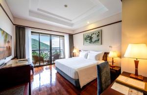 Krevet ili kreveti u jedinici u objektu Vinpearl Resort Nha Trang