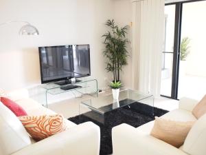 TV i/ili zabavni centar u objektu Edge Apartments Cairns