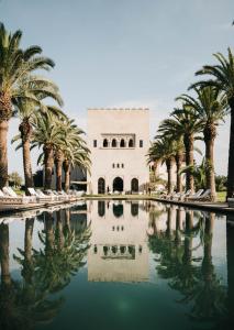 The swimming pool at or close to Ksar Char-Bagh Small Luxury Hotels