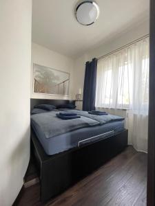 Stylové apartmánky tesisinde bir odada yatak veya yataklar