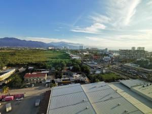 an aerial view of a city with buildings at Holiday Inn & Suites - Puerto Vallarta Marina & Golf, an IHG Hotel in Puerto Vallarta