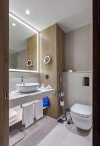 Un baño de Radisson Blu Hotel, Kyiv City Centre