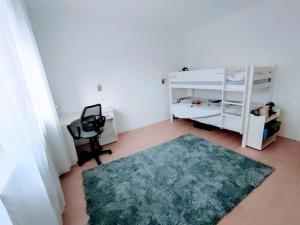 Кровать или кровати в номере Villa Sainte-Rose 3ch à 5 minutes de la Cité des Loisirs