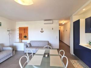 Кът за сядане в Joli appartement face à la mer- St Florent