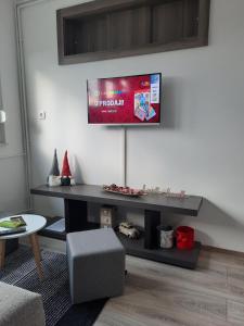 Apartman Ines tesisinde bir televizyon ve/veya eğlence merkezi