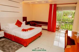 Meru Slopes Hotel में एक कमरे में एक या कई बेड