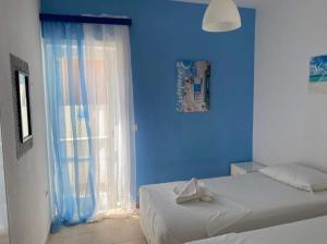 Lova arba lovos apgyvendinimo įstaigoje Corfu Glyfada Beach Apartment 91