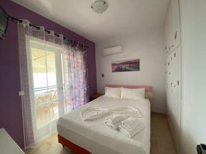 Lova arba lovos apgyvendinimo įstaigoje Corfu Glyfada Beach Apartment 91