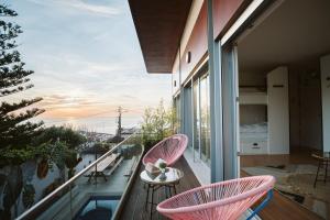 A balcony or terrace at The Salty Pelican Yoga & Surf Retreat