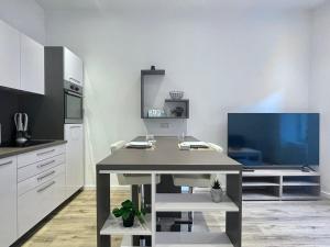 Dapur atau dapur kecil di Appartement Moderne au Coeur du Luxembourg