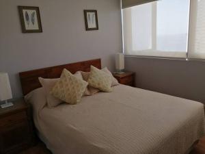 Rent apartment Viña del Mar房間的床