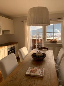 a kitchen with a table with a bowl on top of it at Appartement Aigner in Mauterndorf