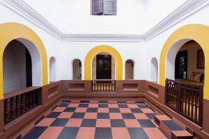 תמונה מהגלריה של SaffronStays Amaya, Kannur - 300 years old heritage estate for families and large groups בקאנור