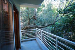 Un balcón o terraza en Coorg Coffee Bean Resort