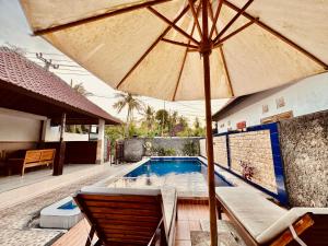 A piscina localizada em Kawi Penida Room ou nos arredores