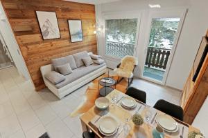 Zona d'estar a Appartement en plein centre de Crans Montana