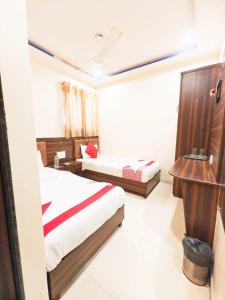 Tempat tidur dalam kamar di Hotel Avion Park - Near Mumbai International Airport