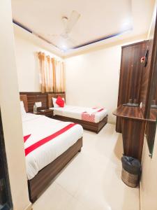 Tempat tidur dalam kamar di Hotel Avion Park - Near Mumbai International Airport