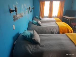 Cama ou camas em um quarto em Hostal Klein